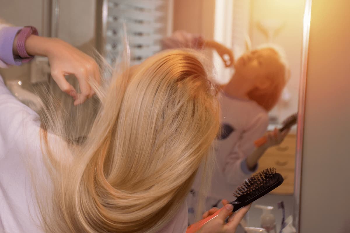 morning routine girl brushes her hair 2023 11 27 04 52 13 utc 1